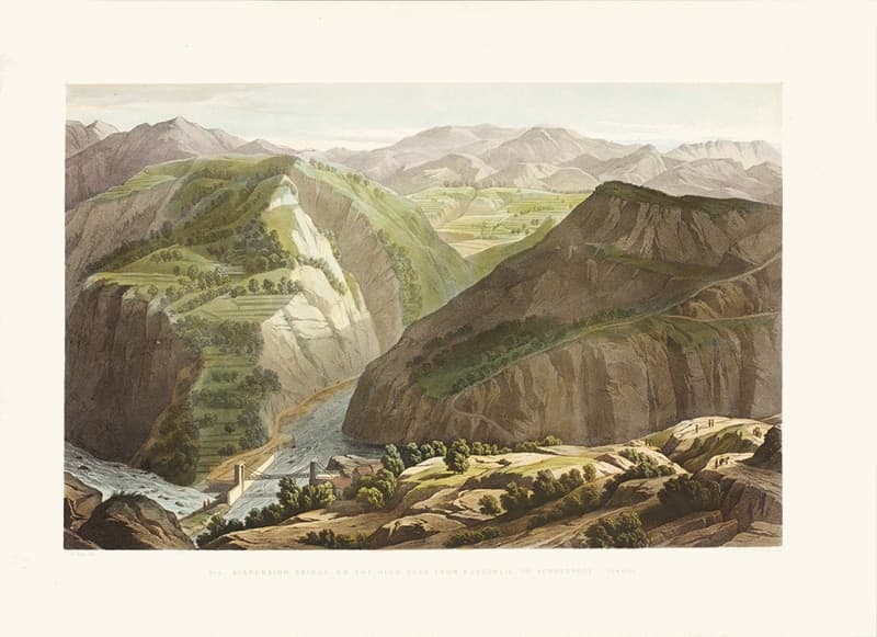 A hand-coloured view of a small suspension bridge across a river gorge, below terraced hills at sunrise